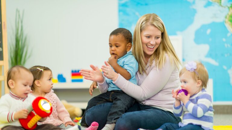 the dedicated teacher engages children by praising them