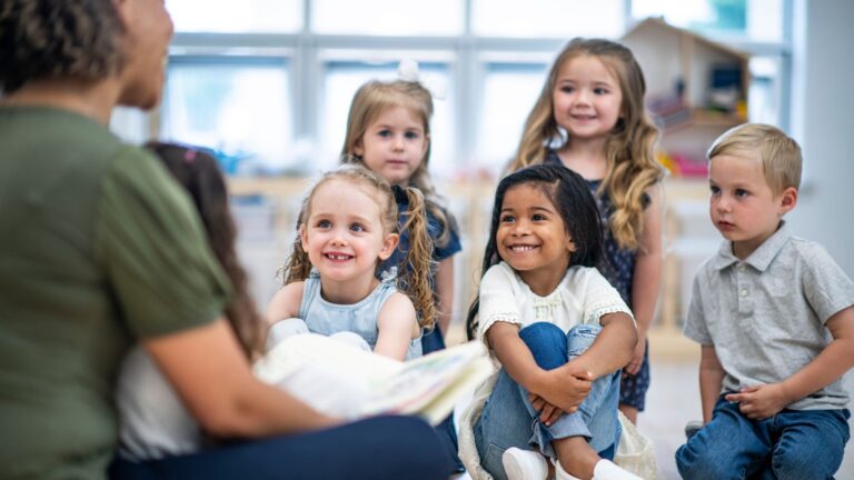 children and the teacher having a harmonious class interaction