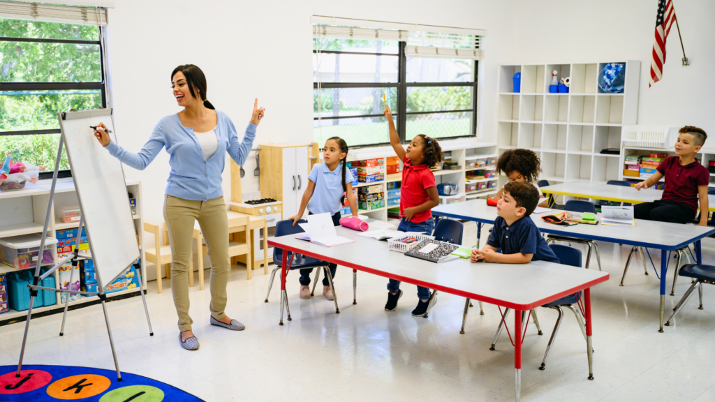 a teacher passionately doing her job to engage students in a class