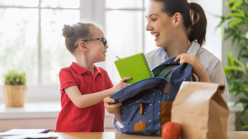 mom-and-kid-preparing-school-essentials