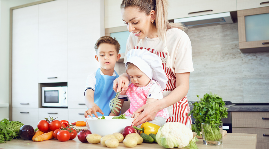 mother and children cooking in the kitchen